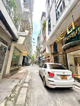 21.5 TỶ – NHÀ NGUYÊN HỒNG – ĐỐNG ĐA | 52M² – 7 TẦNG THANG MÁY | Ô TÔ TRÁNH – DÂN CƯ VĂN MINH